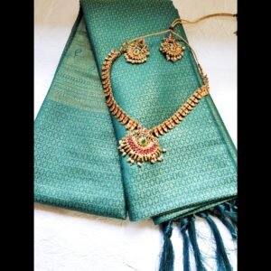 Regal Teal Silk- Draped in timeless charm, silk saree is adorned with delicate golden zari motifs all over, adding a rich and regal touch Readystock